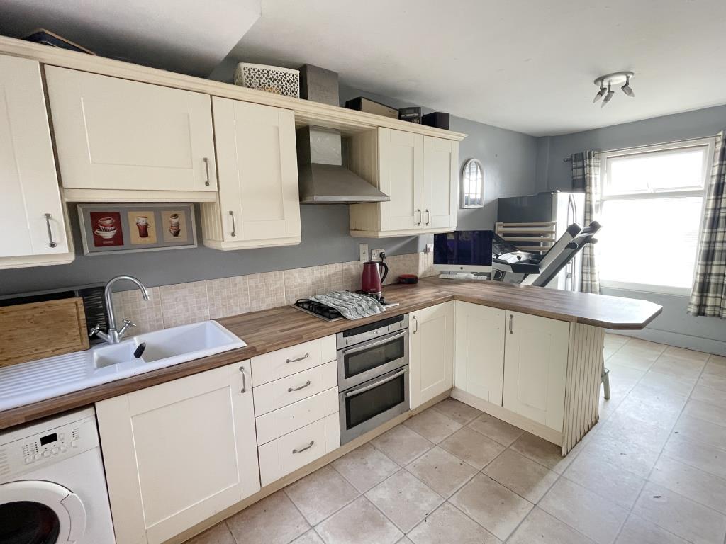 Lot: 105 - SEMI-DETACHED HOUSE FOR IMPROVEMENT - view of kitchen at four bedroom semi
